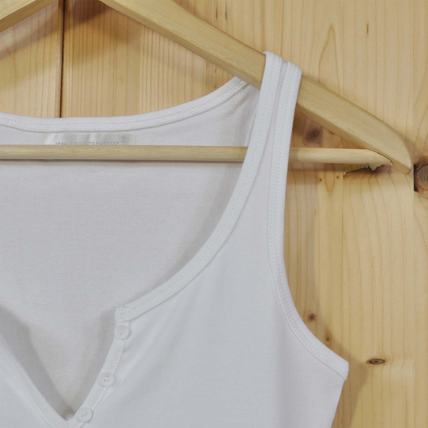 White buttoned tank