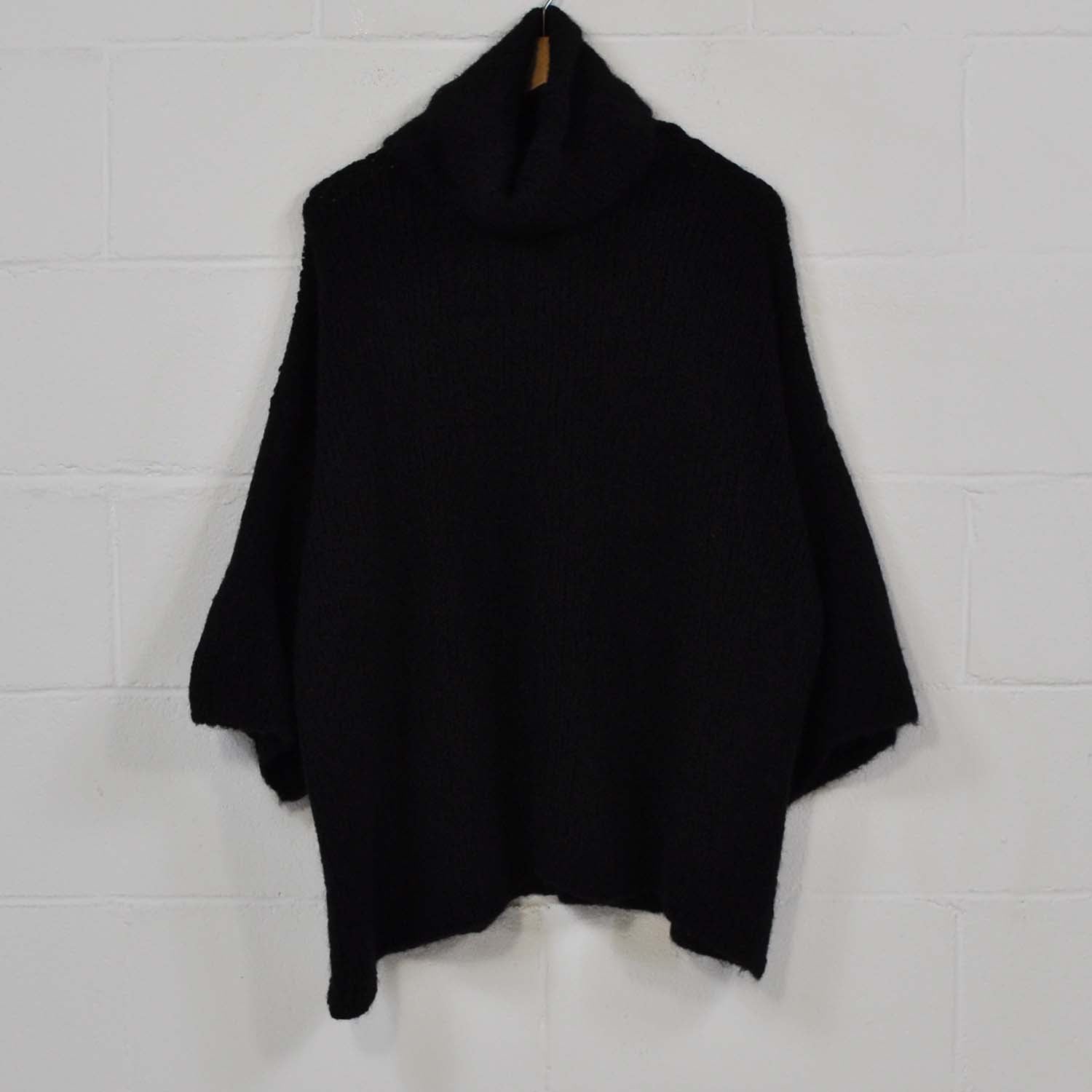 Black poncho sweater